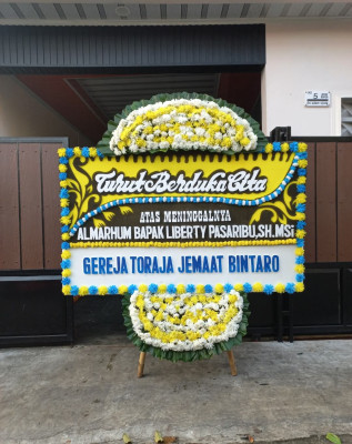 Papan Bunga Duka di Wumialo