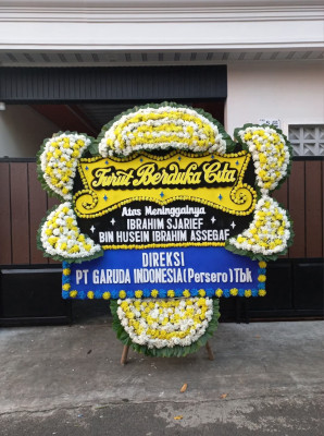 Papan Bunga Duka di Wumialo