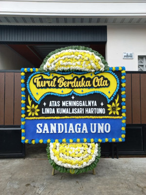 Papan Bunga Duka di Wumialo